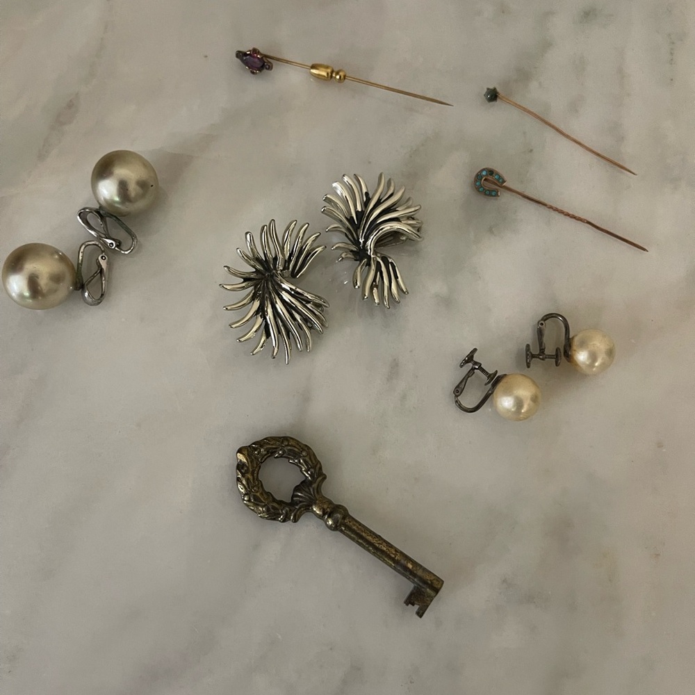 Earrings and gold pins from the 50s